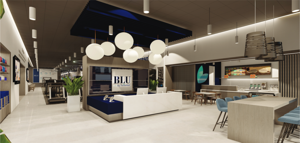 Modern, well-lit interior of a retail or service space with a BLU reception desk, contemporary seating, decorative lighting, plants, and product displays. The design features clean lines and a neutral color palette—a perfect strategy for welcoming sick care clients. Lifestyle